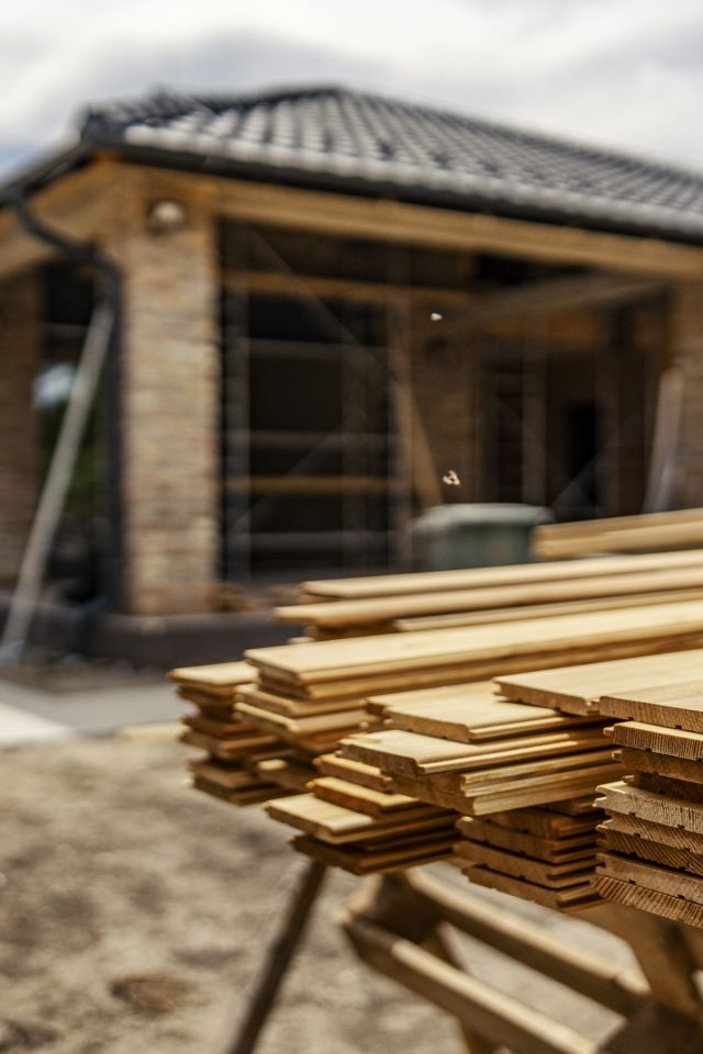Builing Planks in front of a construction